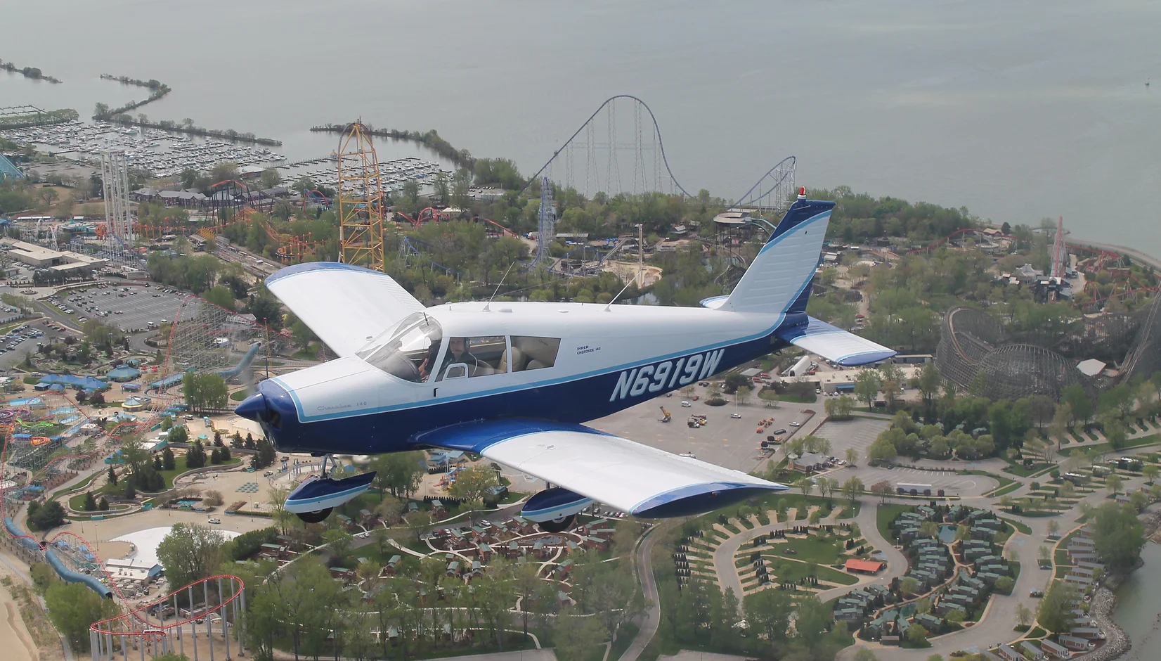 Piper Cherokee in-flight over Cedar Point | Griffing Private Air Charter Plane Flying Service in Port Clinton Ohio