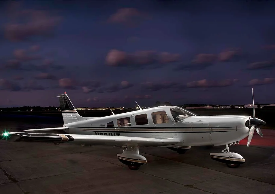 Piper Saratoga Side view at night | Griffing Private Air Charter Plane Flying Service in Port Clinton Ohio