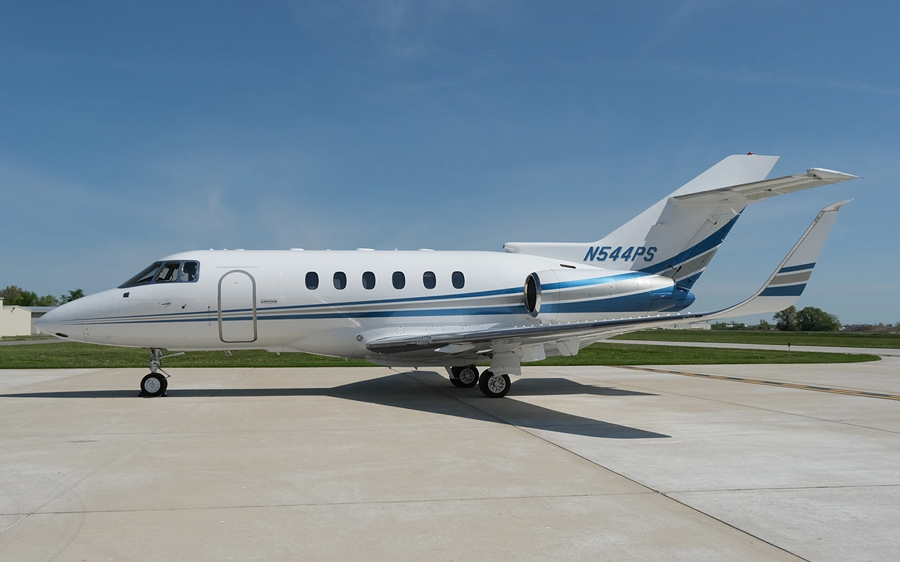 Griffing flying service private charter plane jet hawker 800 side view 